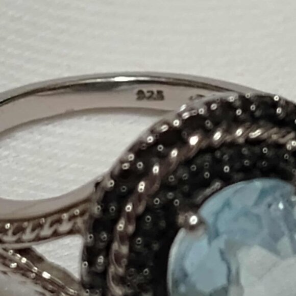 3.10ct Blue Topaz w/ .01ctw Round Black Diamond Accent Rhodium over Silver ring - Picture 6 of 13